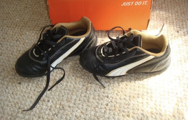 kids black astro trainers